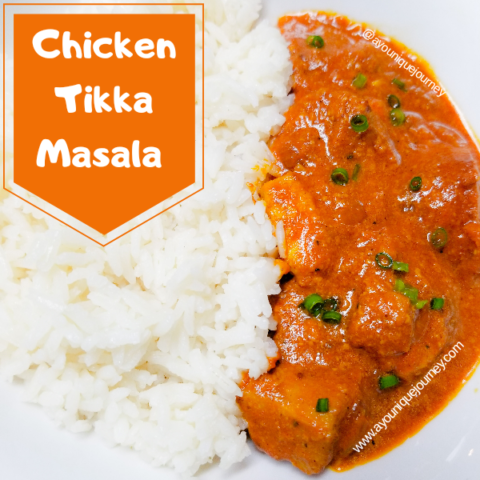 Chicken Tikka Masala with a serving of white rice.