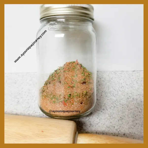 Mixture of jerk seasoning in a mason jar.