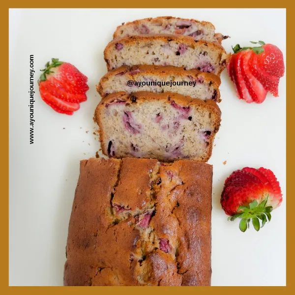 A sliced loaf of Strawberry Banana Bread.