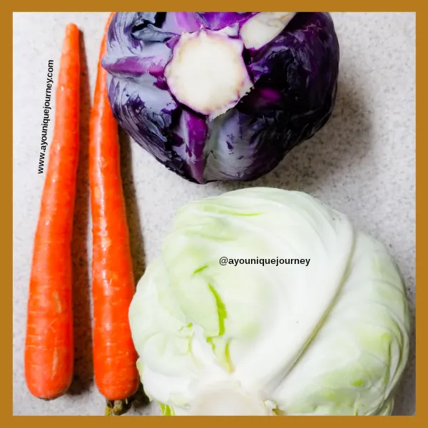 Purple (red) cabbage, green cabbage and two carrots.
