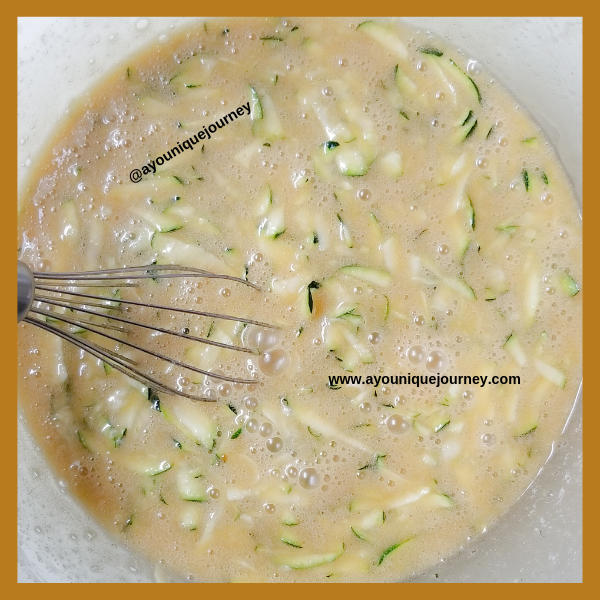 Mix in the grated Zucchini to the wet ingredients.