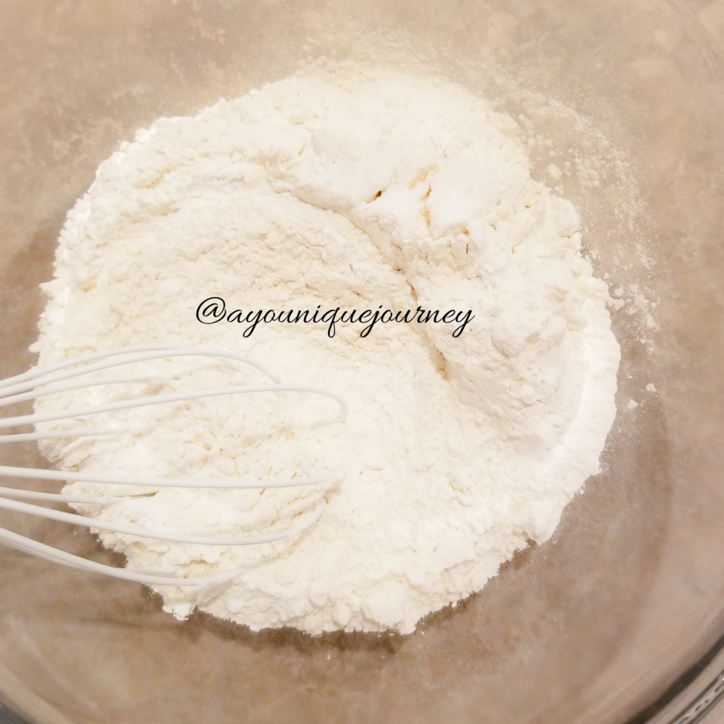 Whisking the dry ingredients: flour, salt and baking powder.