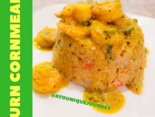 A serving of Turn Cornmeal with some Coconut Curry Shrimp on top.