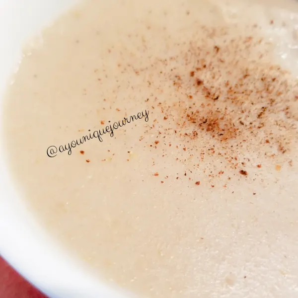 A close of Banana Oatmeal Porridge with some grated nutmeg on top.