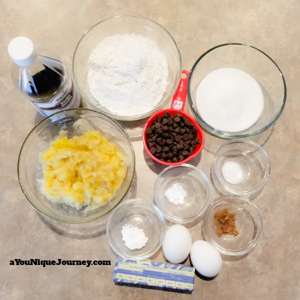 All the ingredients to make a Chocolate Chip Banana Bread.