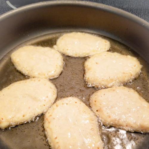 Frying the Banana Fritters.
