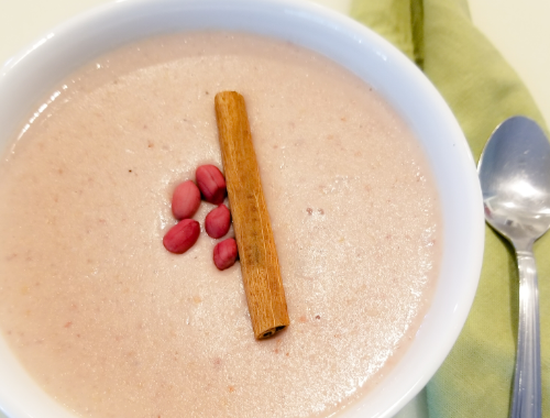 Jamaican Peanut Porridge in a white bowl.