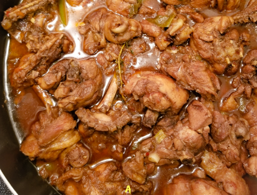 Jamaican Brown Stew Chicken in a large skillet.