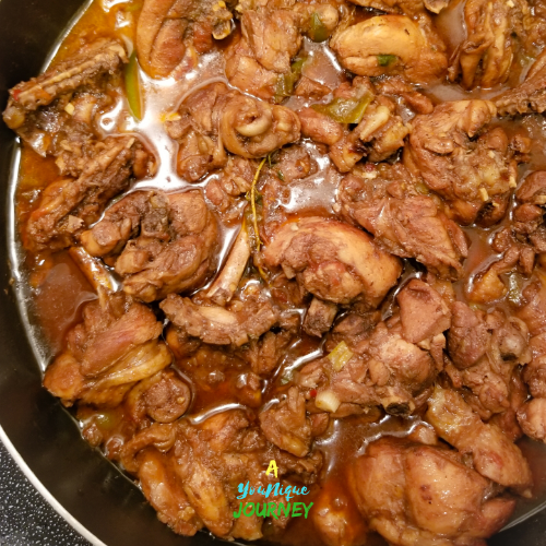Jamaican Brown Stew Chicken in a large skillet.