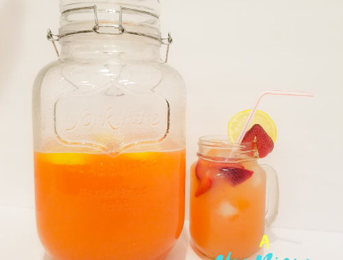 Strawberry Lemonade in a mason jar.
