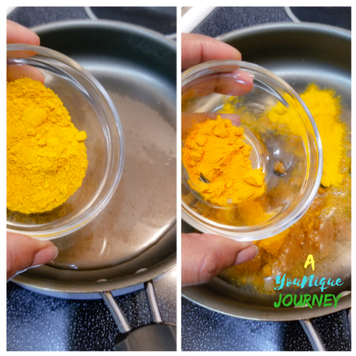 Adding the curry powder and turmeric powder to the oil.