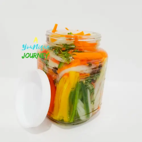 https://ayouniquejourney.com/wp-content/uploads/2020/09/Jamaican-Escovitch-Pickle-Sauce-Recipe-7.png.webp