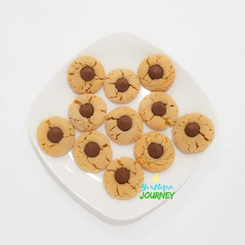 Peanut Butter Blossoms on a white plate.