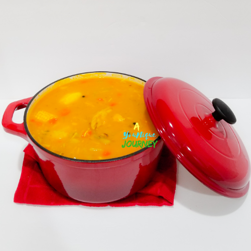 A pot of Jamaican Chicken Pumpkin Soup.