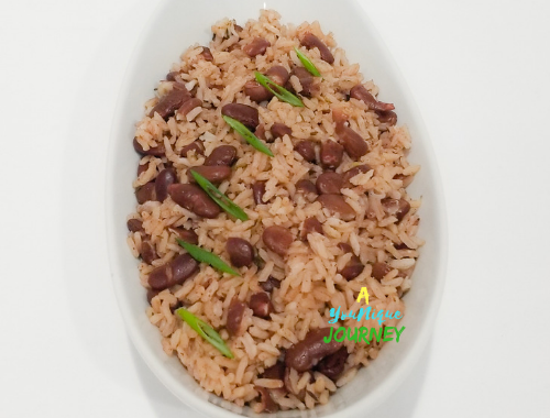 A white bowl with Jamaican Rice and Peas,