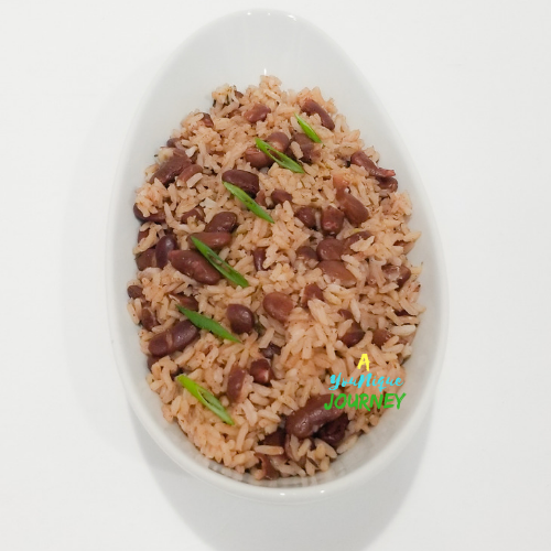 Jamaican Rice and Peas Recipe in a white serving bowl.
