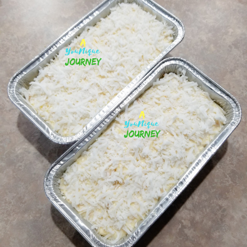 Pour the mixture in loaf pans with the remaining shredded coconut on top.