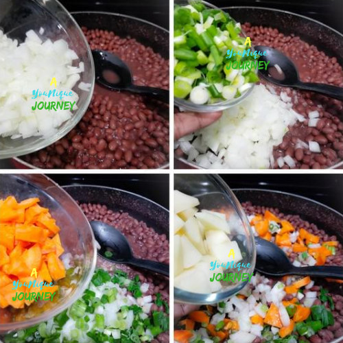Adding the onions, scallions, carrots and diced potatoes to the cooked beans to make Jamaican Vegan Stew Peas.