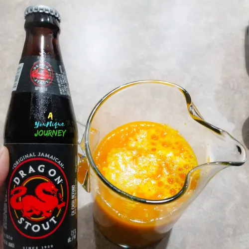 Adding a Jamaican Dragon Stout to the blended pumpkin punch.