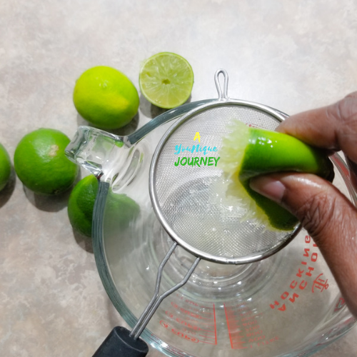Juicing the limes to add to the Jamaican Ginger Beer later.